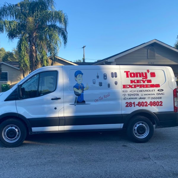 Mobile auto locksmith van from Tony's Keys Express on-site at a customer home in Houston TX for car key replacement